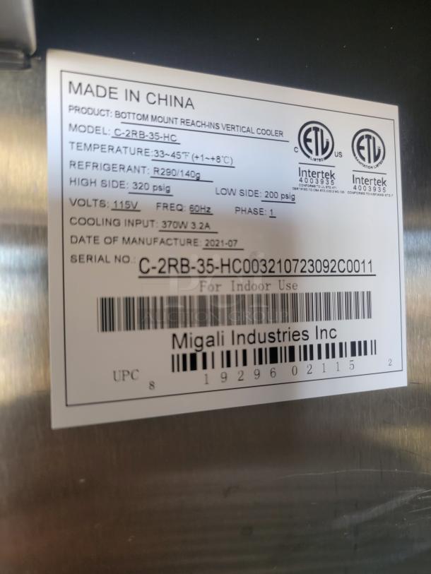 Label on Migali C-2RB-35-HC vertical cooler, made in China. Specs: 33-45°F, R290 refrigerant, 115V, manufactured July 2021.