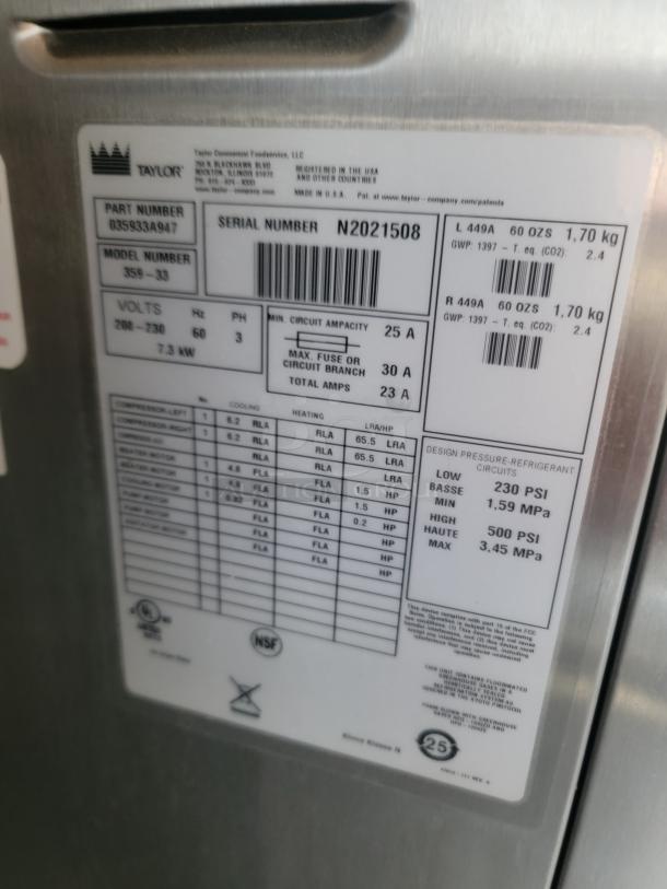 Label on a Taylor machine showing part number 035933A947, model number 350-33, and serial number N2021508. Specifications include 60 Hz, 3-phase, 208-230 volts, and 7.3 kW.
