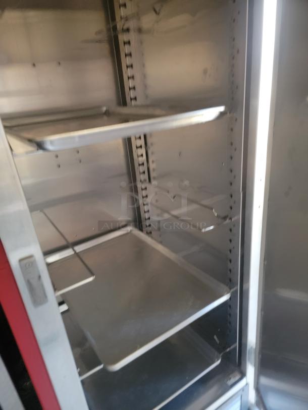 Stainless steel commercial warming cabinet, multiple shelves, adjustable racks, large capacity, excellent condition.