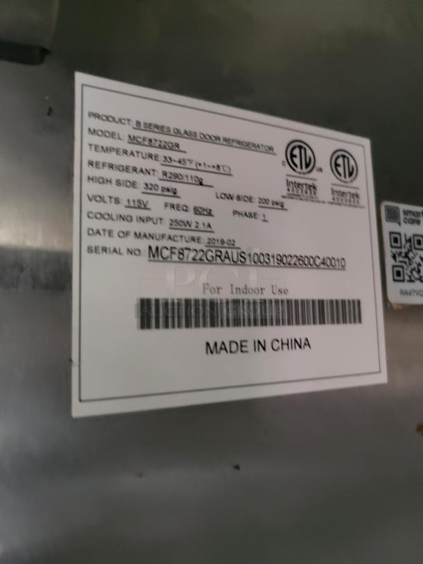Label on refrigerator model MCF872GR; lists specs like refrigerant, voltage, and manufacture date. Made in China.