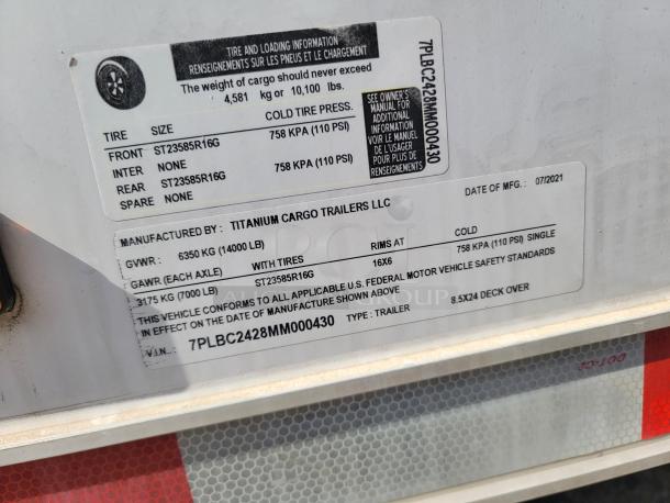 Label on Titanium Cargo Trailer indicating model 8.5x24 deck over, with a GVWR of 6350 kg. Manufactured in 07/2021. VIN: 7PLBC2428MM000430.