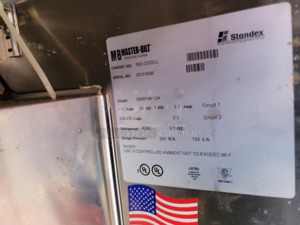 Master-Bilt refrigeration unit label showing model MBSP48-12A, 115V, R290 refrigerant, with American flag sticker.