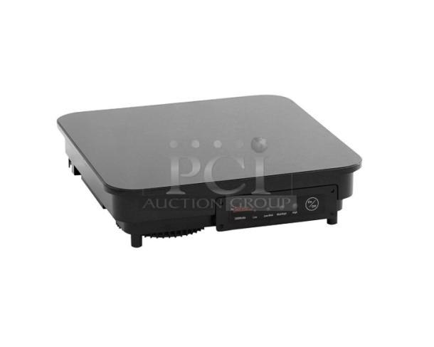 Brand new Spring USA SM300CR black single burner induction warmer, 120V, countertop model, electric powered.