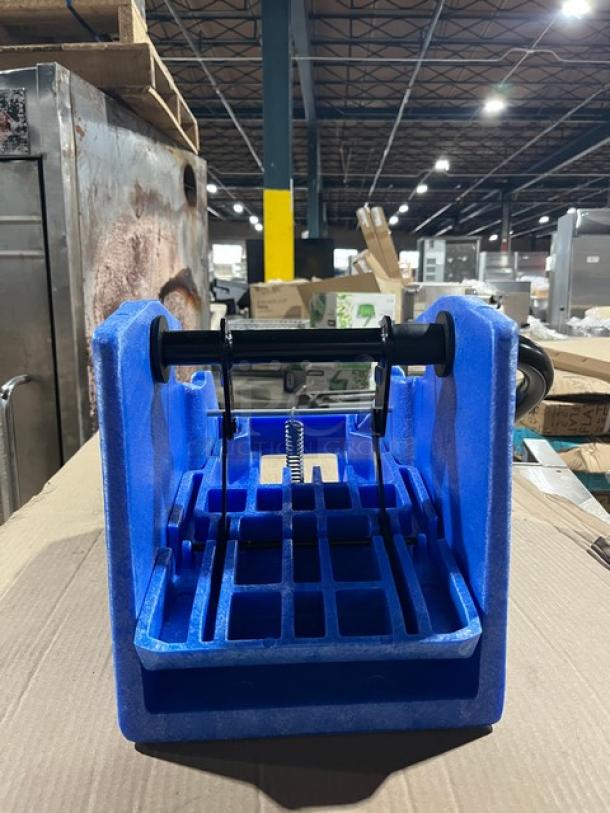 Brand new commercial plastic blue mop side press wringer, model WH6000B, in excellent condition.