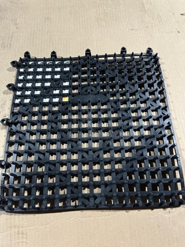 Brand new San Jamar Versa-Mat VM5280BK, 1' x 1' interlocking black bar mat, commercial grade, grid pattern.