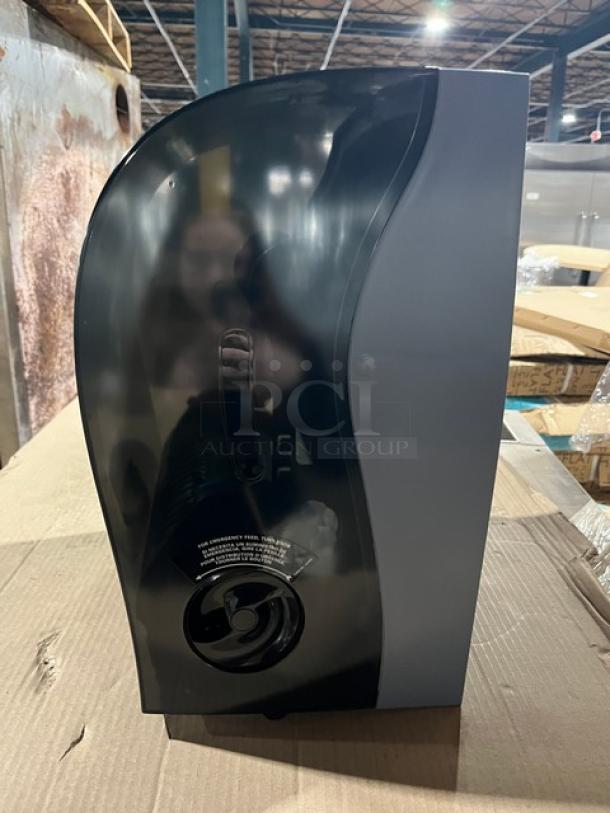 Kimberly Clark Professional Series smoke black paper towel dispenser, sleek design, commercial grade, new condition.