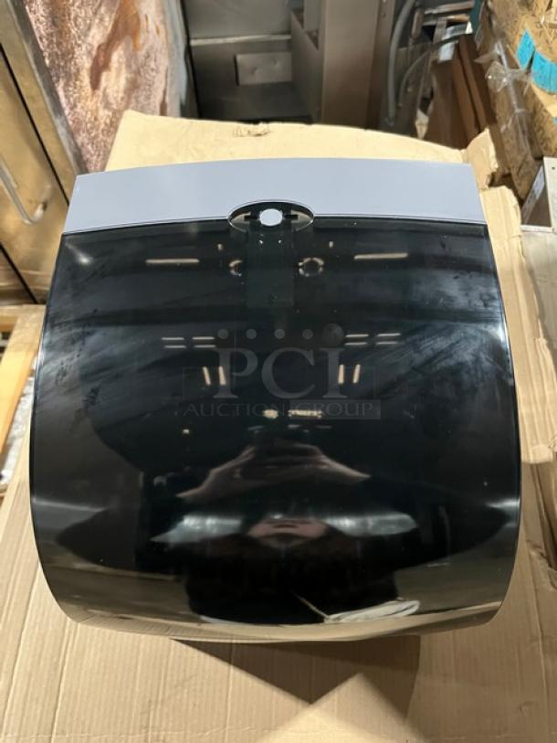 Kimberly Clark Professional Series Sanitouch smoke black hard-roll paper towel dispenser, commercial-grade, used condition.