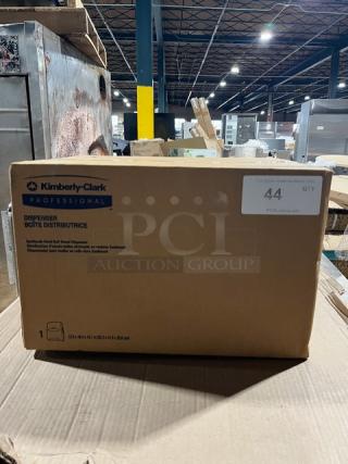 Kimberly Clark Professional Sanitouch paper towel dispenser in box, new condition, smoke black color.