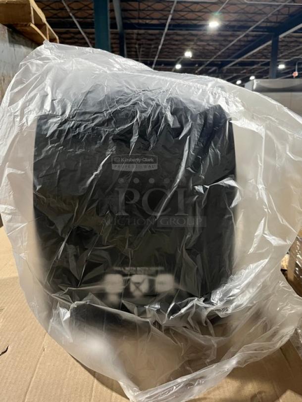 Kimberly Clark Sanitouch Hard-Roll Paper Towel Dispenser in plastic wrap, brand new, smoke black color.