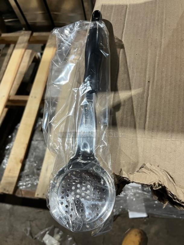 Brand new Vollrath Jacob’s Pride 3 oz perforated spoodle, Model 6432320, with black grip handle, sealed in packaging.