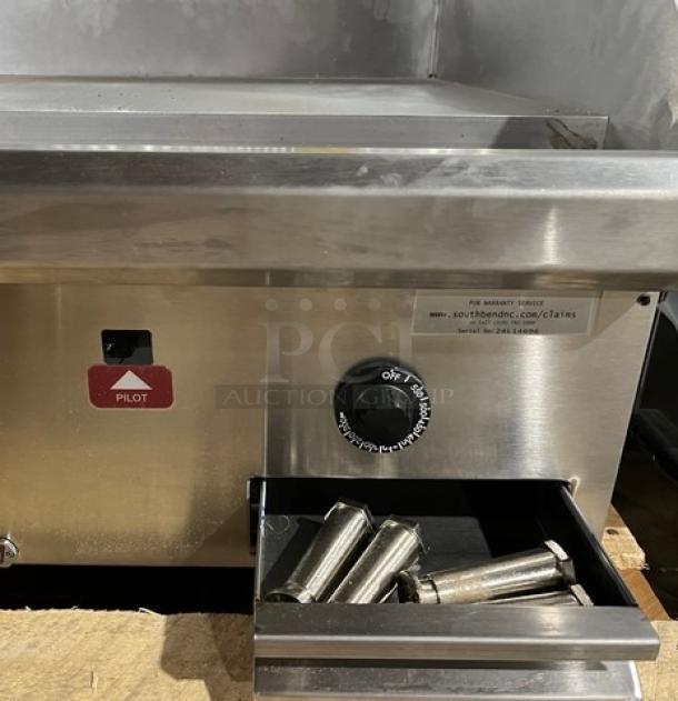 Southbend HDG-36 stainless steel gas countertop griddle. Features back and side splash, control knob, and pilot light. Serial: 24L14696.