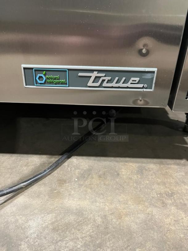 True Commercial Stainless Steel Refrigerated Chef Base, Model TRCB-52-60, features oversized worktop, two drawers, on casters.