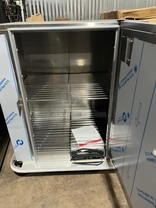 Carter-Hoffmann stainless steel heated cabinet, model BB60-40, brand new with insulated door and wired rack, 120V.