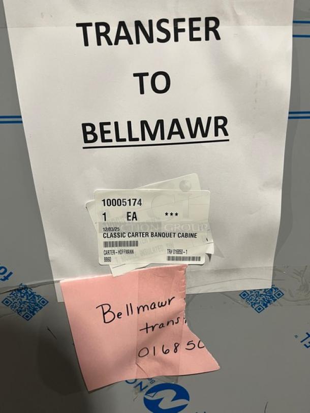 Carter-Hoffmann BB60-40 stainless steel heated cabinet, new, with wired rack. Labels indicate model and transfer details.