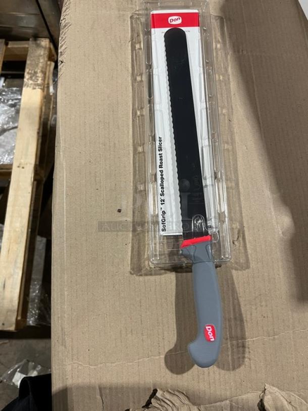 Brand new 12" Don Dexsteel Series scalloped roast slicer, model 1002679, with slip-resistant SofGrip handle, in packaging.