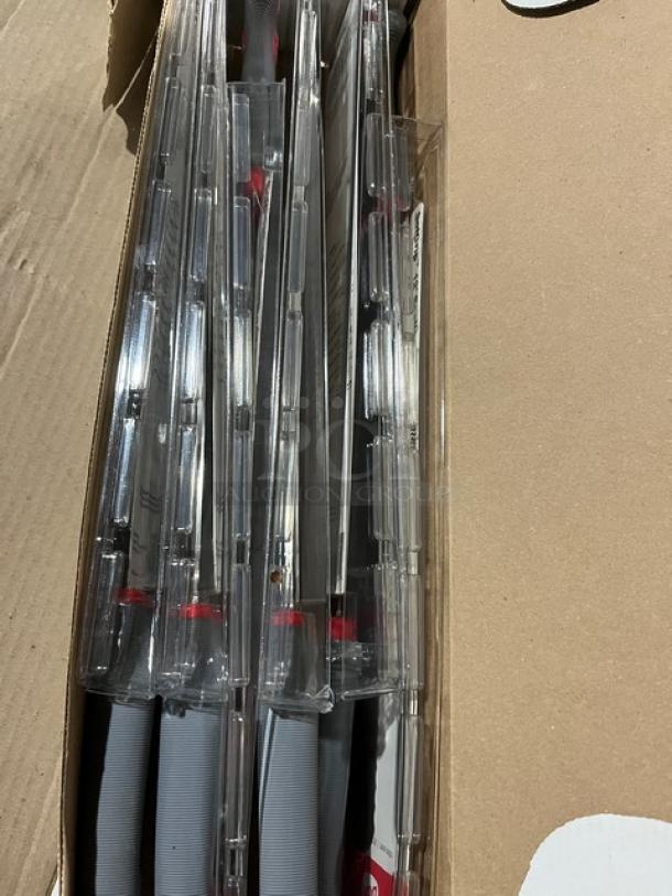 Brand new Don Dexsteel 12" scalloped roast slicers in packaging. Model 1002679 with SofGrip handles.