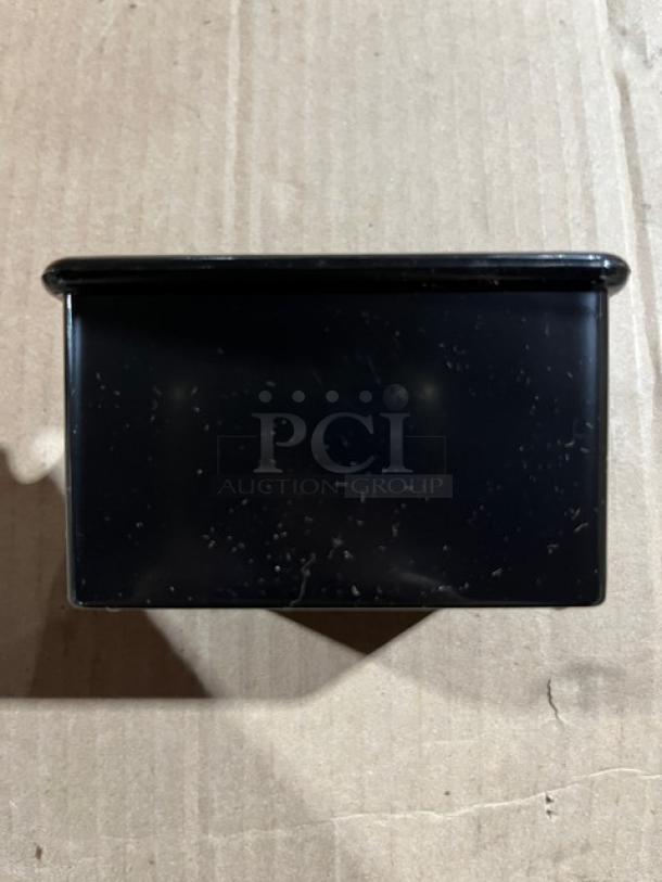 Brand new black commercial condiment caddie, model SC-66, in pristine condition.