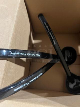 Carlisle NSF2 black ladles, 9.5", new condition, labeled "White Balsamic Vinaigrette," set in a cardboard box.