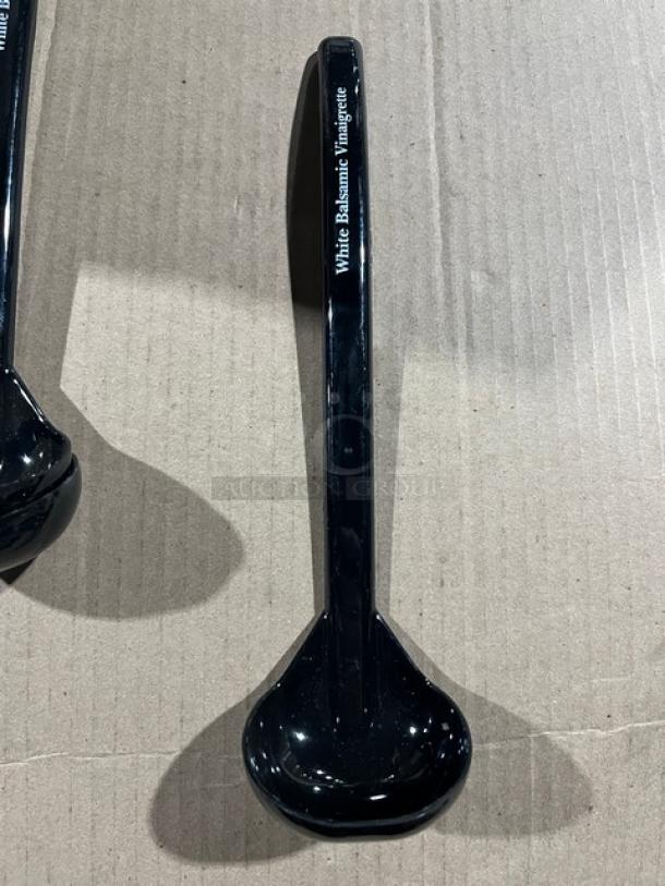 Brand new Carlisle NSF2 9.5" ladle, black, labeled "White Balsamic Vinaigrette," commercial quality.