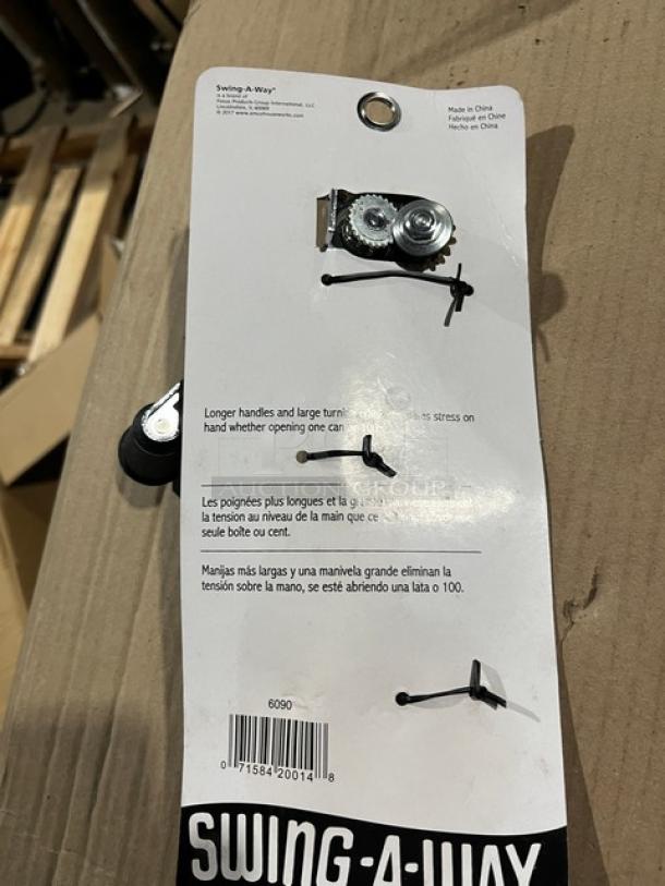 Brand new Swing-A-Way commercial stainless steel can opener with black grip handle on branded packaging.