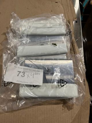 Brand new Jimmy John's style stainless steel dough scraper with white grip handle, packaged in plastic, 4 units.