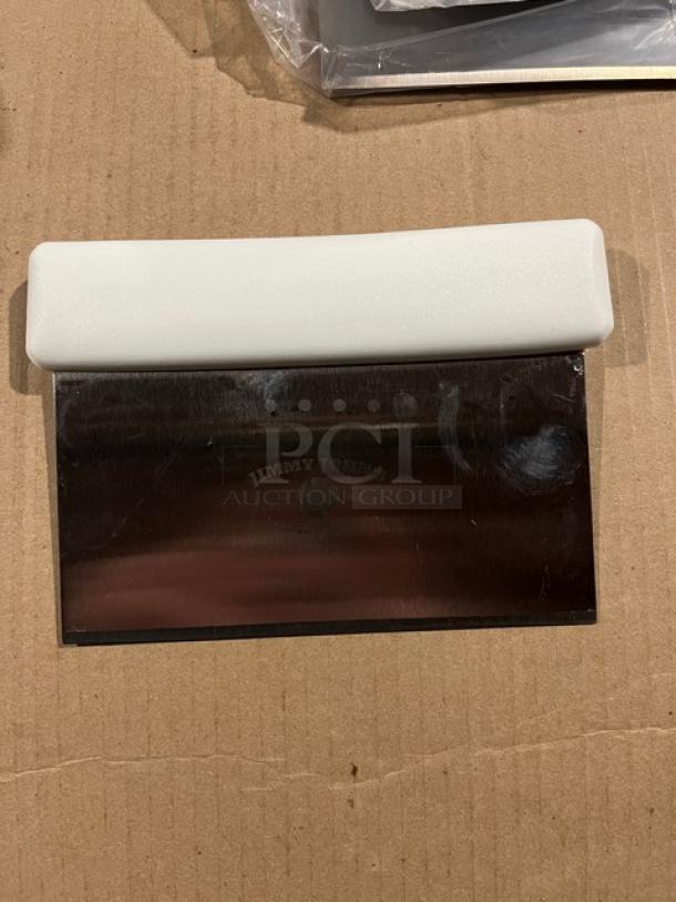 Brand new Jimmy John's style stainless steel dough scraper with white grip handle, featuring logo imprint, commercial-grade.