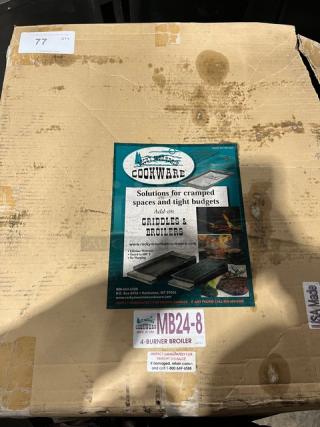 Rocky Mountain Cookware MB24-8 4-burner broiler, brand new in box, includes removable grease tray. Model MB24-8 label visible.