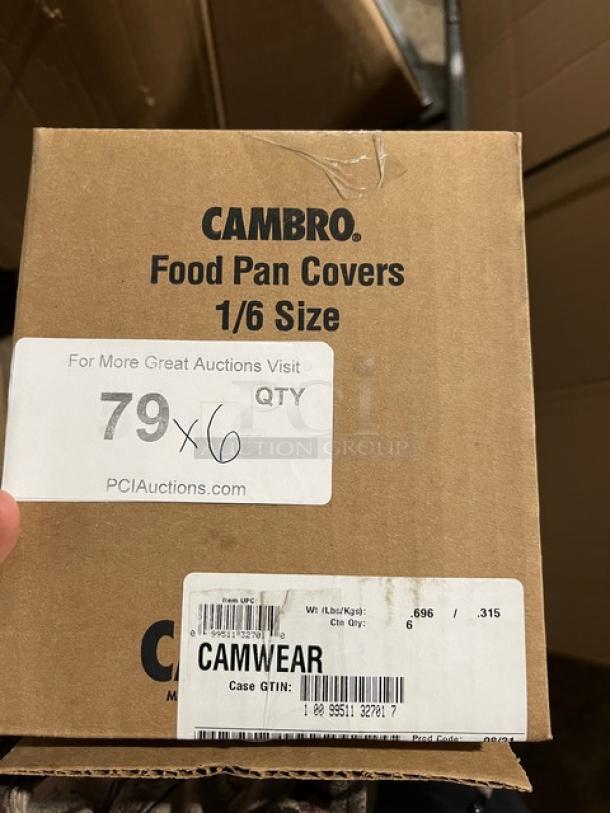 Cambro Camwear Series 1/6 Size Food Pan Covers, Model 60CWC135, new in box. Includes six covers. Auction label visible.