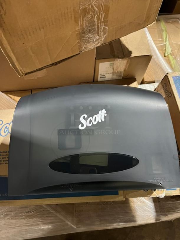 Scott Commercial Smoke Black Jumbo Roll Bath Tissue Dispenser, Model 09602, brand new in original packaging.