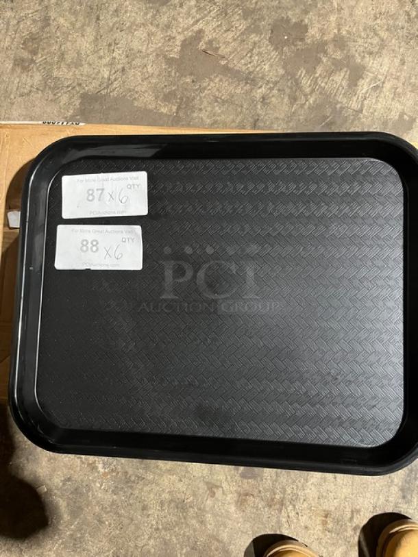 Carlisle black 14"x18" fast food tray, model CT141803, brand new condition with labels indicating lot quantities.