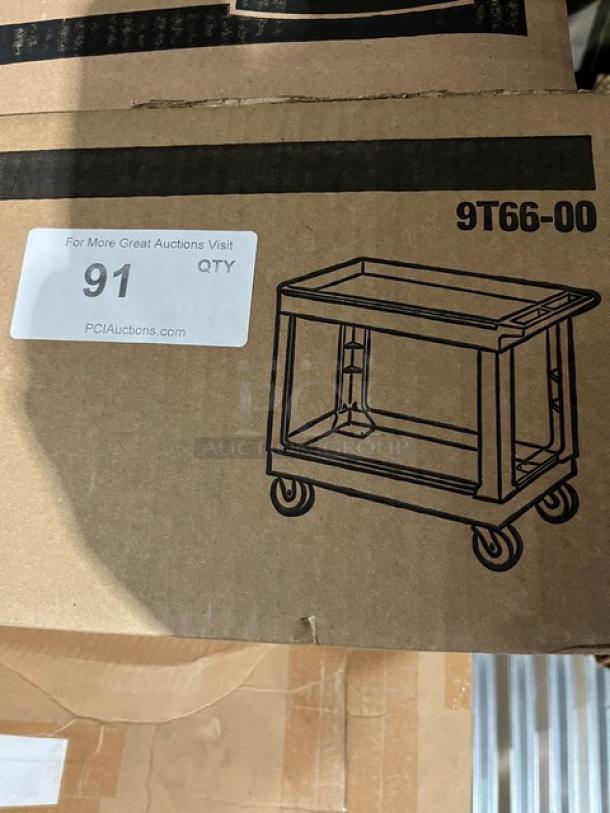 Rubbermaid Commercial Utility Cart, Model 9T66-00, on casters, new in box. Label shows auction info and model sketch.