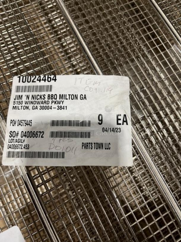 Brand new stainless steel deep fry basket with front hook and non-slip grip handle. Tag shows shipment details and part numbers.