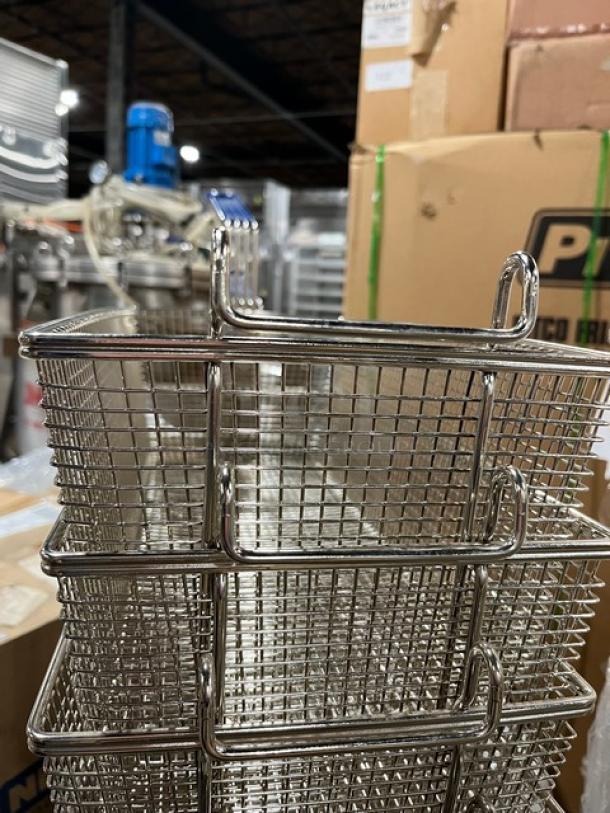 Brand new commercial stainless steel deep fry basket with front hook and non-slip grip handle, shown in pristine condition.