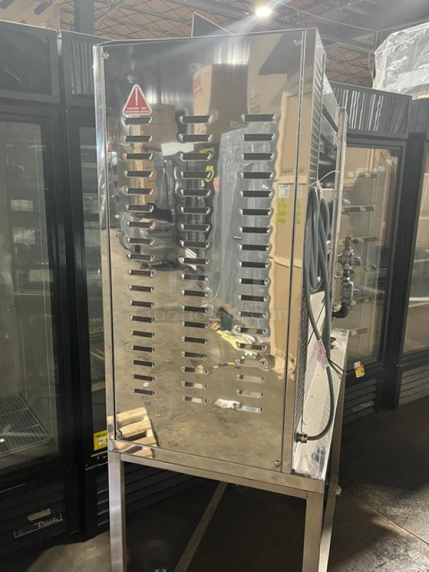 Brand new Rotisol 1160.4 stainless steel natural gas rotisserie oven with tempered glass swing doors, on casters.