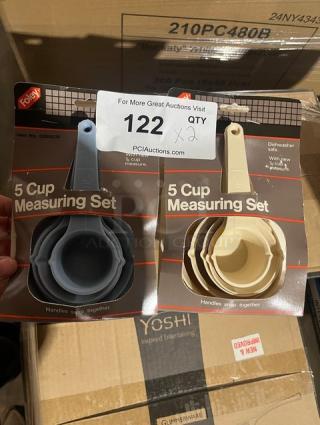 Brand new Foley 5-cup measuring set, gray and cream, snap-together handles, dishwasher safe, in original packaging.
