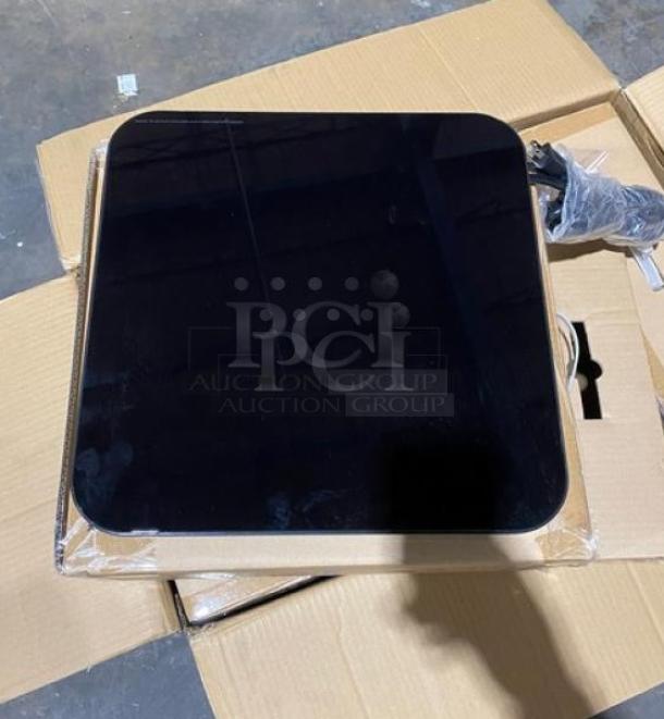 Brand new Spring USA SM-300CR induction warmer, black, single burner, electric, model SM300CR, shown in packaging.