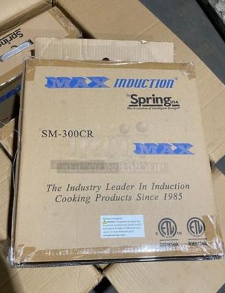 Brand new Spring USA SM300CR induction warmer in box. Black, electric-powered, countertop burner, model SM-300CR, 120V.