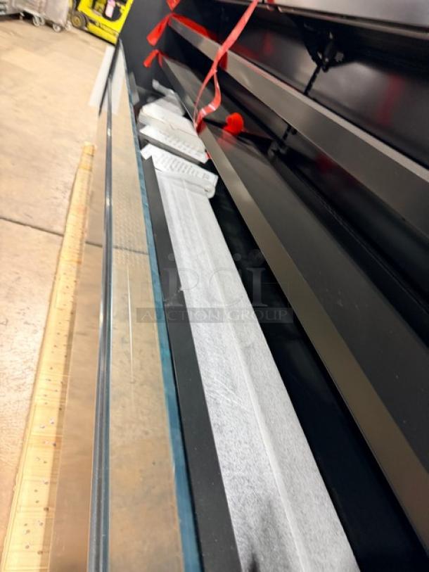 Southern Case Arts refrigerated merchandiser on pallet, Model MDC53LVN-090, new condition, remote compressor unit, 115V 1 Phase.