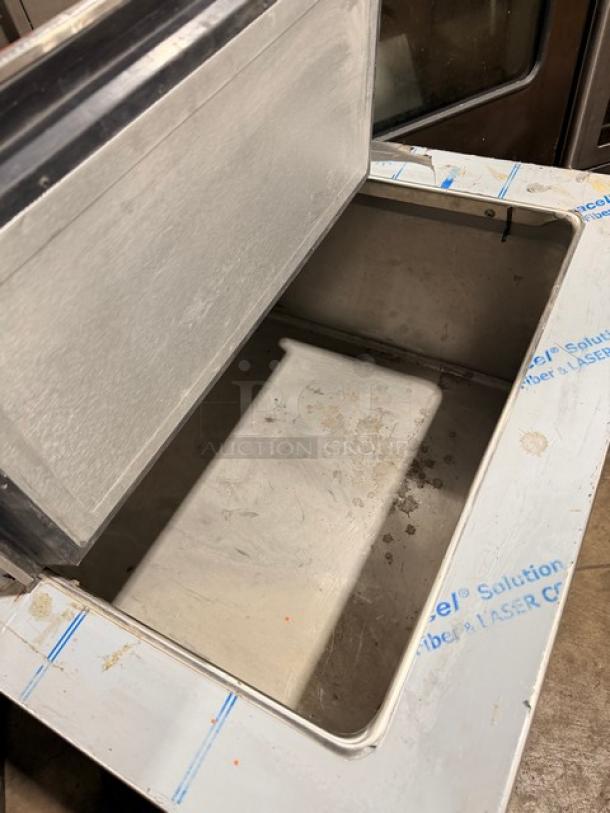 New Randell 9552A drop-in freezer/plate chiller, 115V, 1 Phase. Slight markings inside. Lid open, new condition.