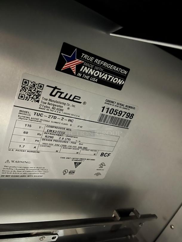 BRAND NEW True TUC-27D-2-HC stainless steel 2-drawer refrigerated lowboy/worktop cooler, SN: 11059798, on casters.