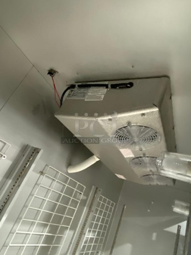 Brand new Leader ESFR79 3-door stainless steel reach-in freezer with poly-coated racks; model ESFR79, serial H0820044.