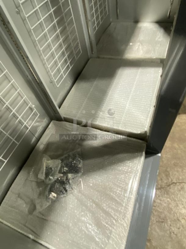 Brand new Leader ESFR79 3-door stainless steel freezer with poly-coated racks. Includes packaging and accessories, model shown.