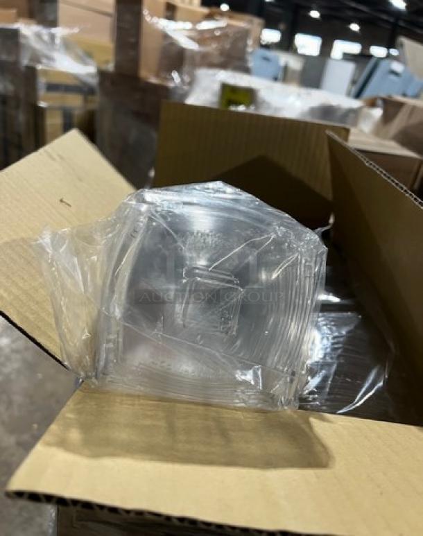 Mixed pallet with Kraft table toppers, Riedel wine glasses (Model 6408/90), and commercial pet bowls, teaspoons, and food trays.