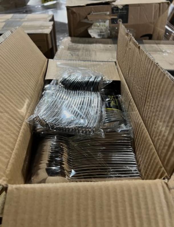 Brand new mixed pallet with Kraft table toppers, Riedel wine glasses, 64oz pet bowls, silver teaspoons, food trays, 8oz pet bowls with lids.