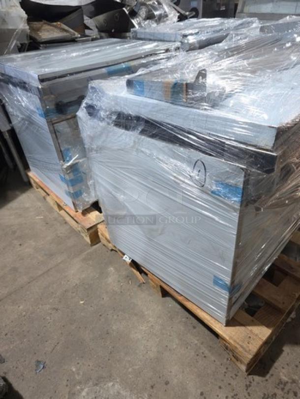 NEW Asber Style Model 6B-G gas-powered 6-burner range with full-size oven, wrapped in plastic, on a pallet.