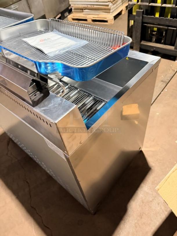 Brand new Goreous stainless steel dual bay electric deep fat fryer with cabinet base and legs, includes baskets.