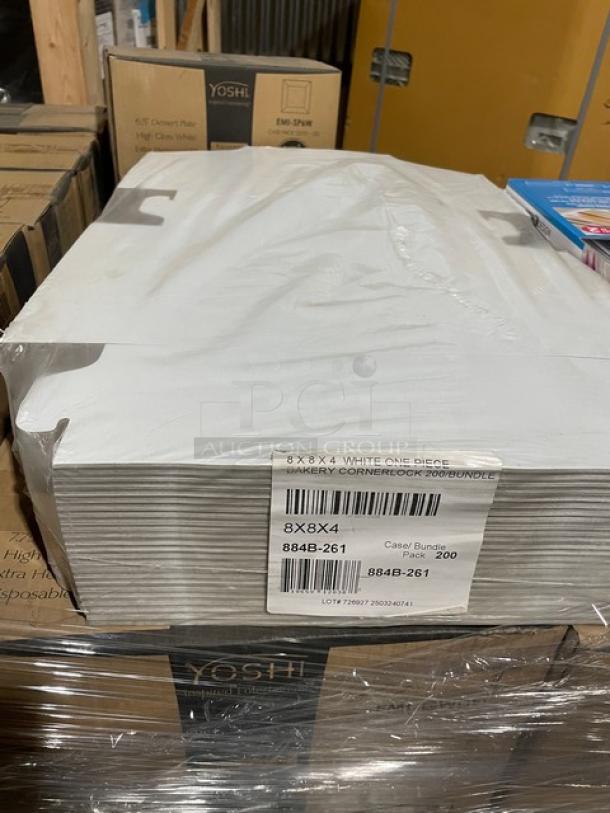 Stack of 8x8x4 white bakery cornerlocks, labeled 200 per bundle. New condition, part of mixed pallet with plates and forks.