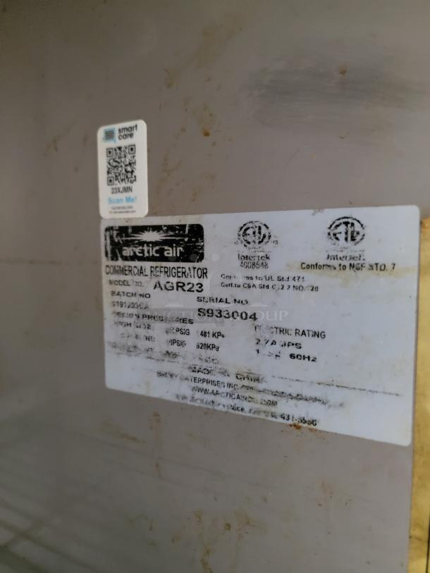 Arctic Air commercial refrigerator label with model AGR23 and serial S933004, indicating design pressures and electric rating.