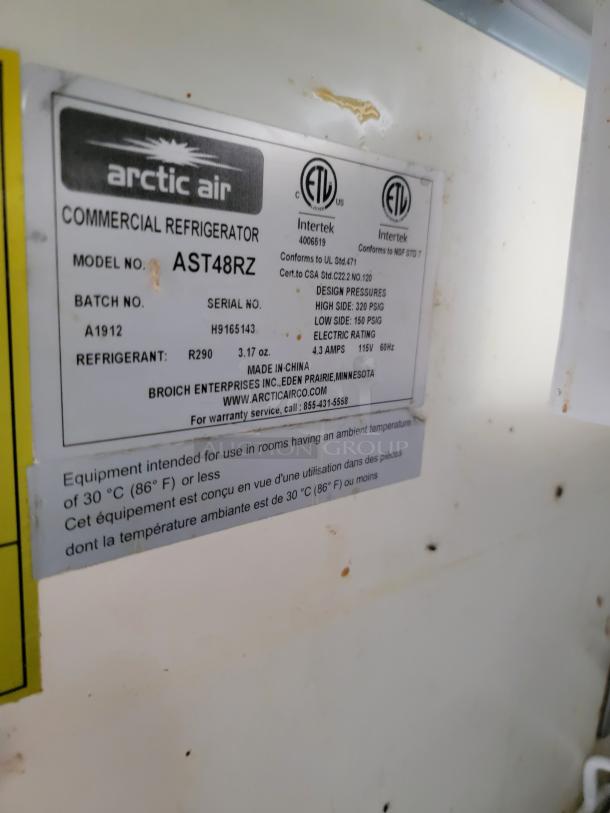 Arctic Air commercial refrigerator label, showing model AST48RZ, serial H9165143, and specifications. Used condition.