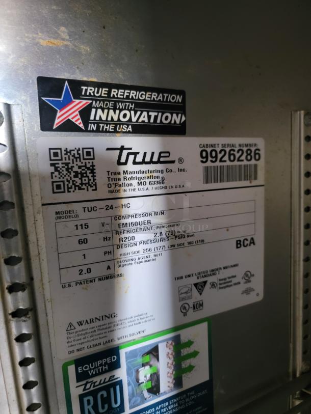 True Refrigeration unit label, model TUC-24-HC. Features serial number 9926286, R290 refrigerant, 115V. Made in USA.
